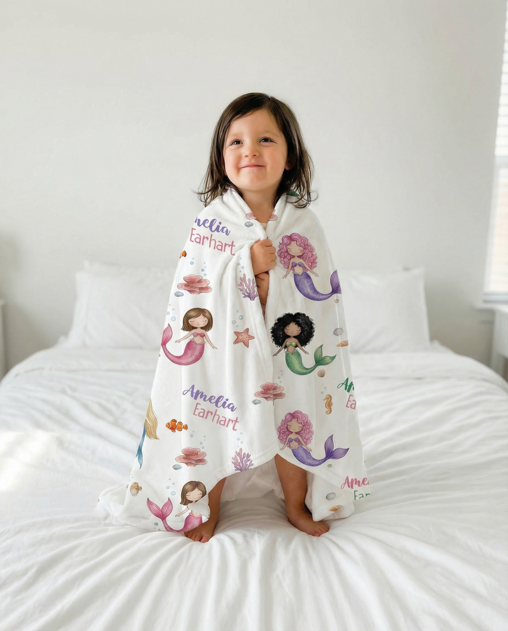 Prettybirds Facebook ad: Her Name + Mermaids = The Blanket She'll Never Let Go