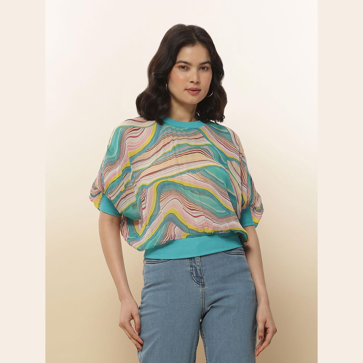 Label Ritu Kumar Facebook ad: Step out in style with our dresses, tops…