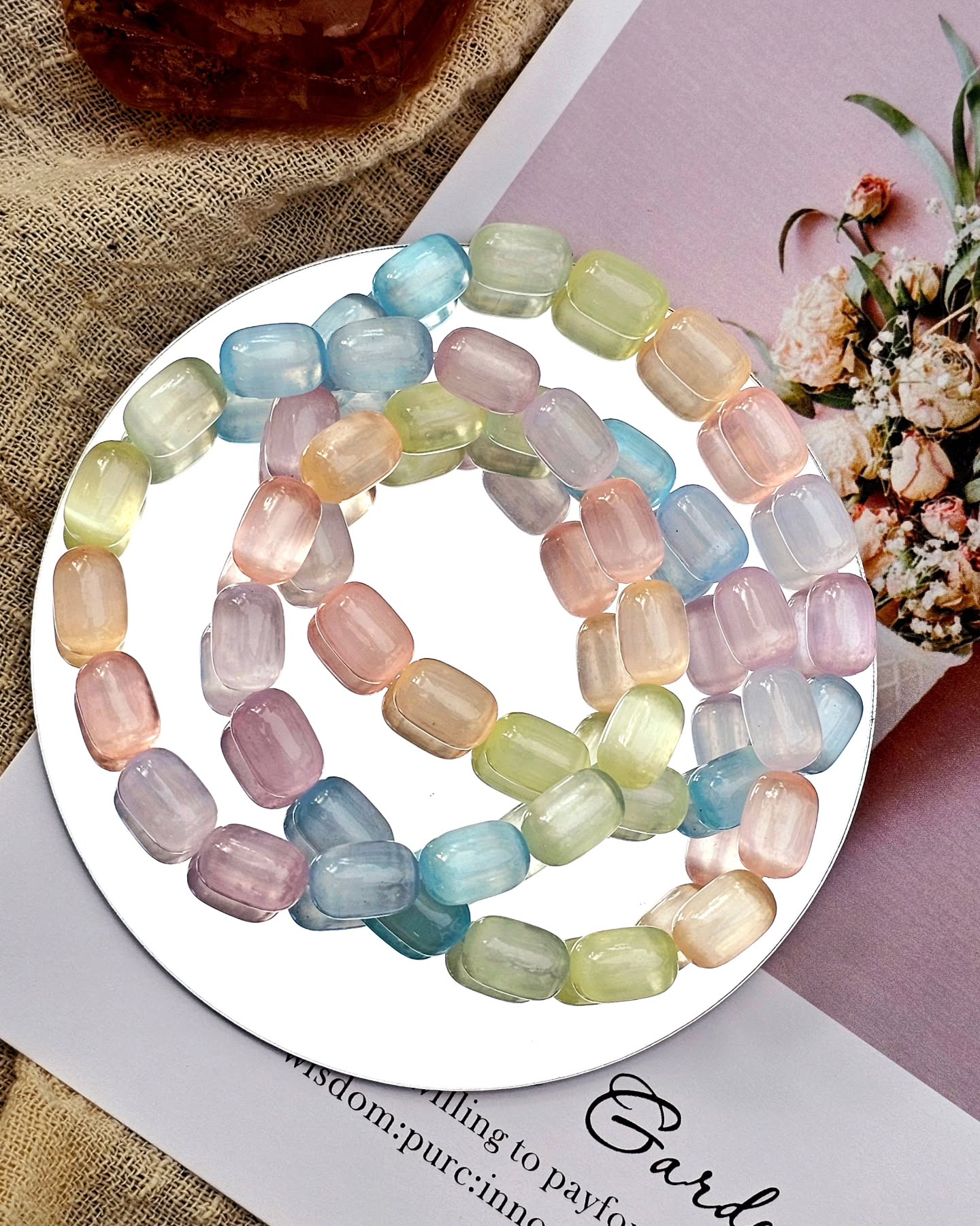 opalandaura.crystals Facebook ad: Your aura called-it wants this Rainbow Selenite Bracelet!