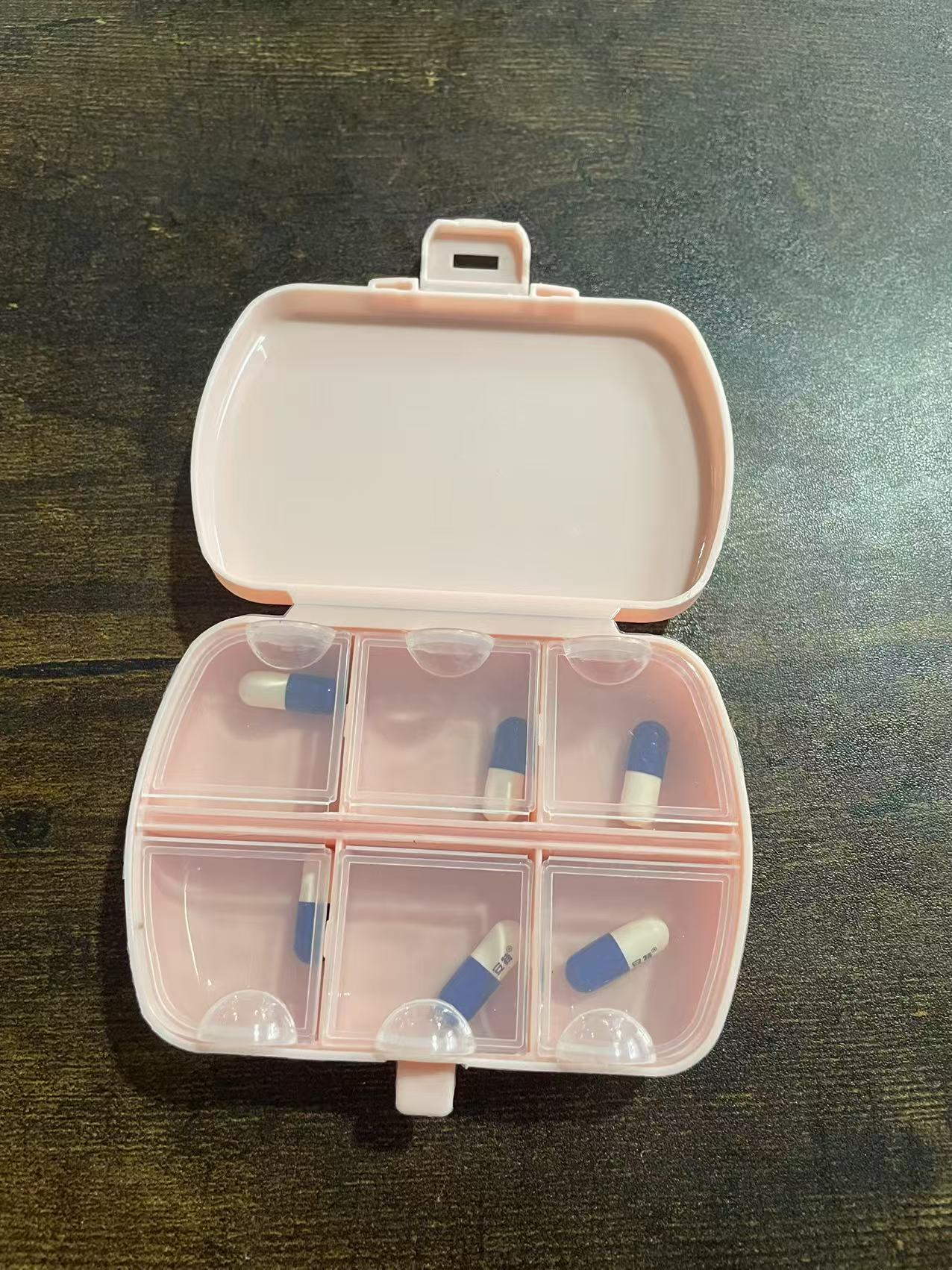 Innovative Tools for Homes Facebook ad: Smart Plastic Pill Box, your daily medication hero!