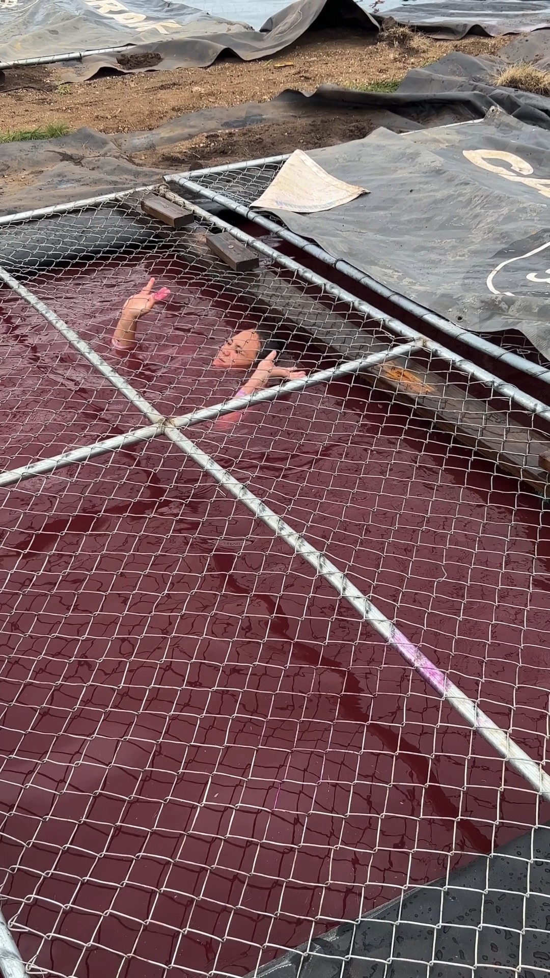 Tough Mudder Facebook ad: Pulling yourself through a 48' pit of water…