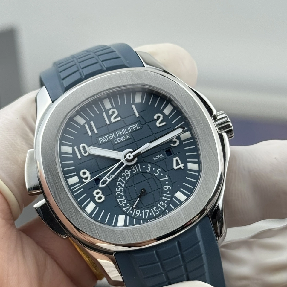 World Luxury Watches Facebook ad: Textured blue dial, brushed steel bezel, and integrated…