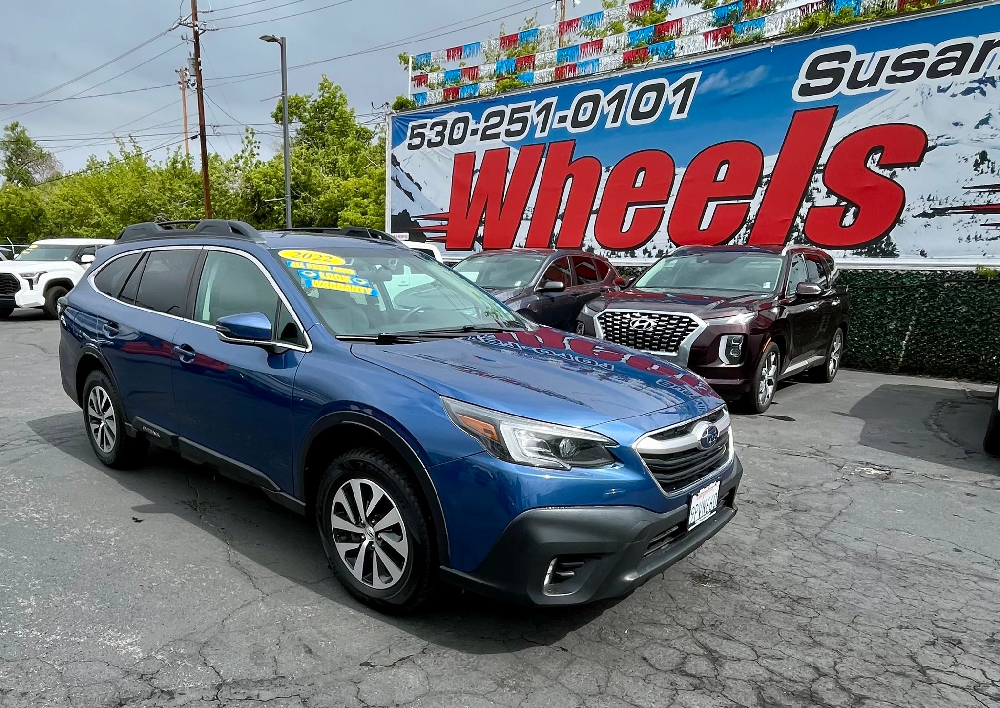 Wheels West Facebook ad: 2022 Subaru Outback Premium AWD with 61k miles…
