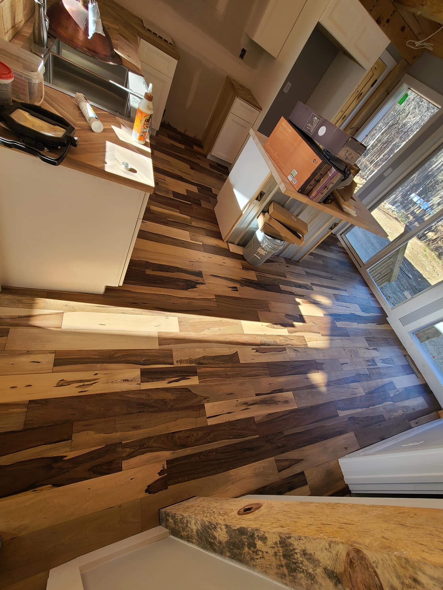 LM Fllors Facebook ad: installation of lvp flooring, laminate, glued and much…