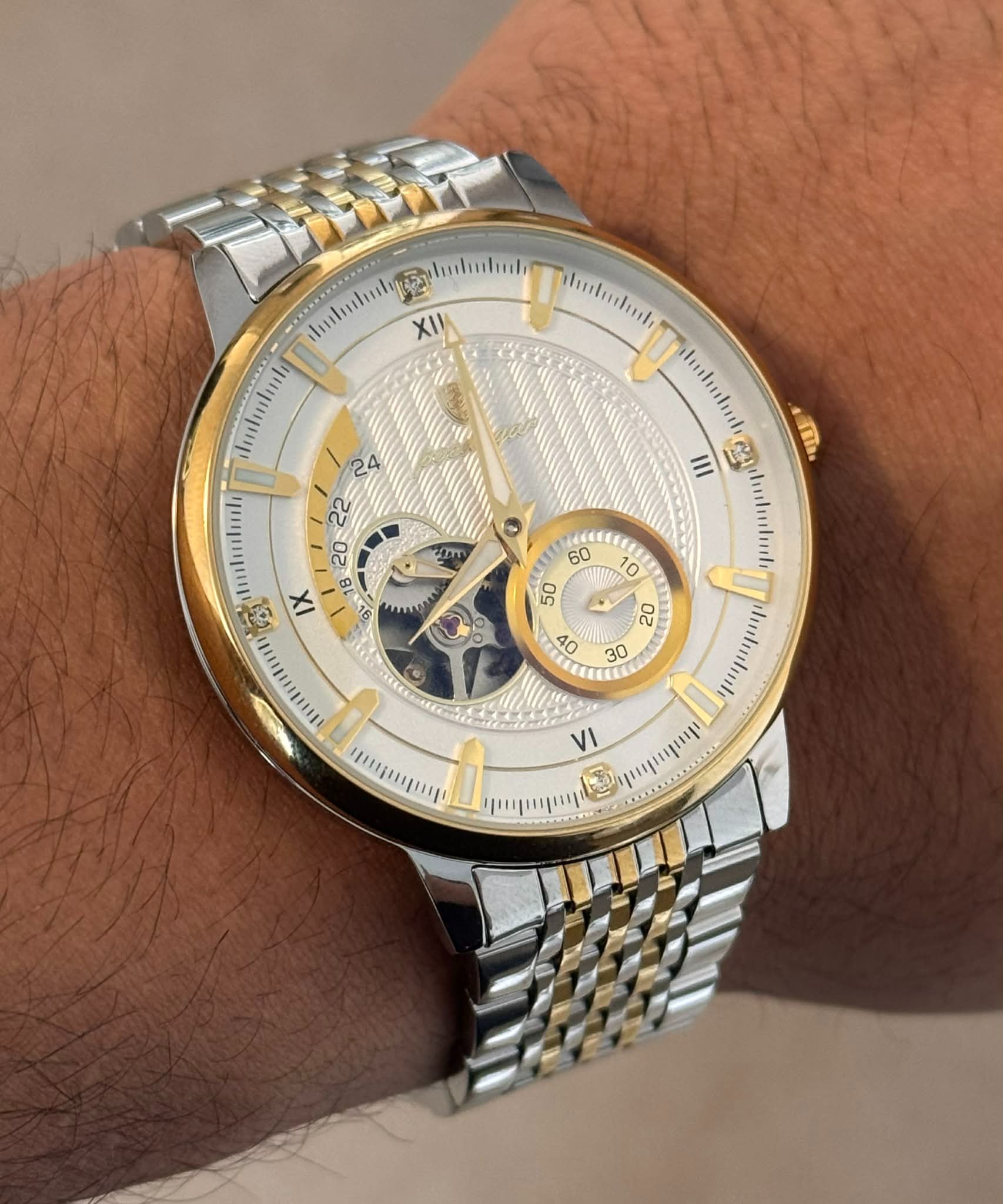 Khald East Facebook ad: Luxury Automatic Skeleton Watch, Gold & Silver |…