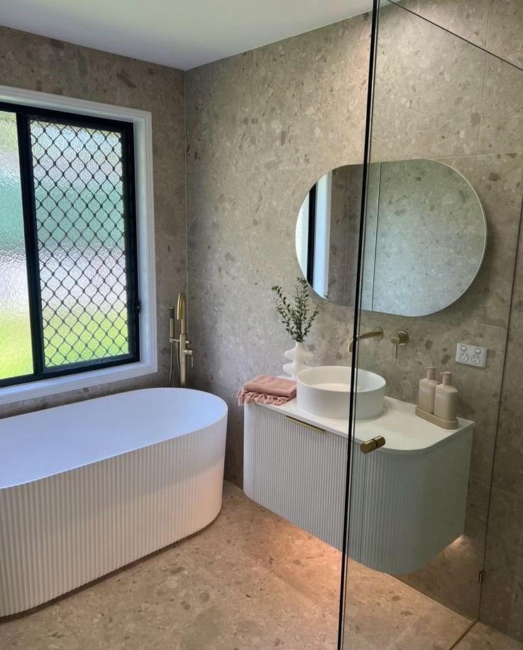 Osarc Bathroom Renovation Specialist Facebook ad: Elevate Your Space: Premium Bathroom Renovations by Osarc!