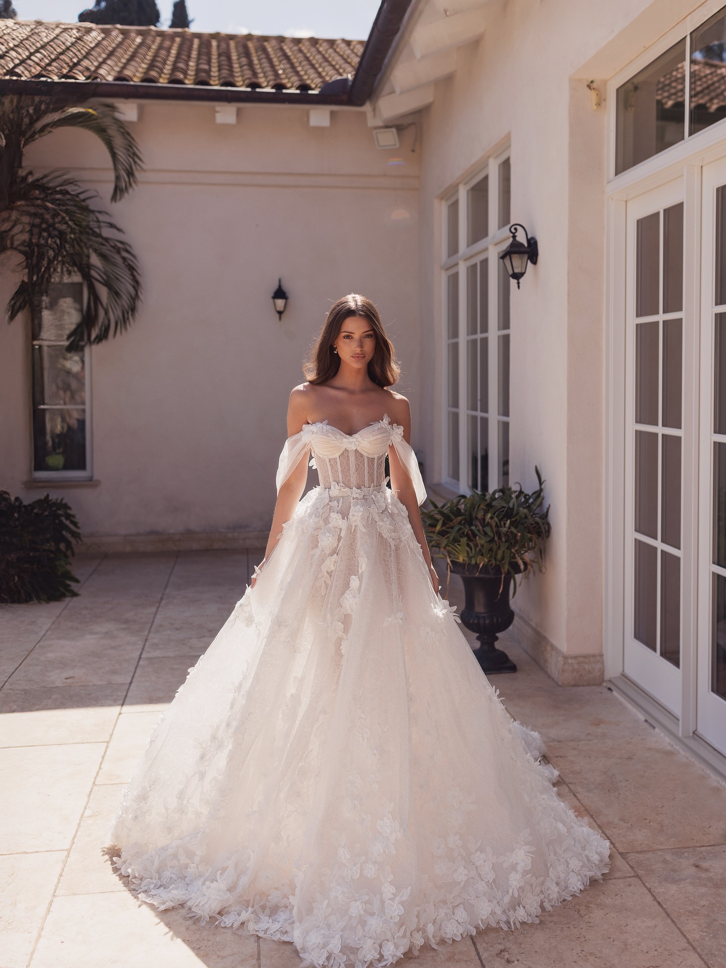 Adi Shlomo Bridal Facebook ad: CHARLOTTE - blooming elegance for a modern-day fairytale.