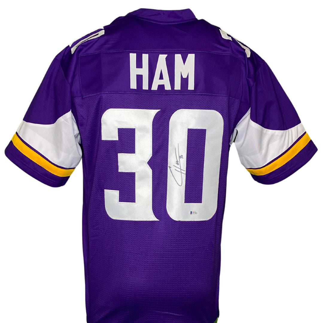 Universal Sports Auctions Facebook ad: Proud partners of the Minnesota WIld, Vikings, &…