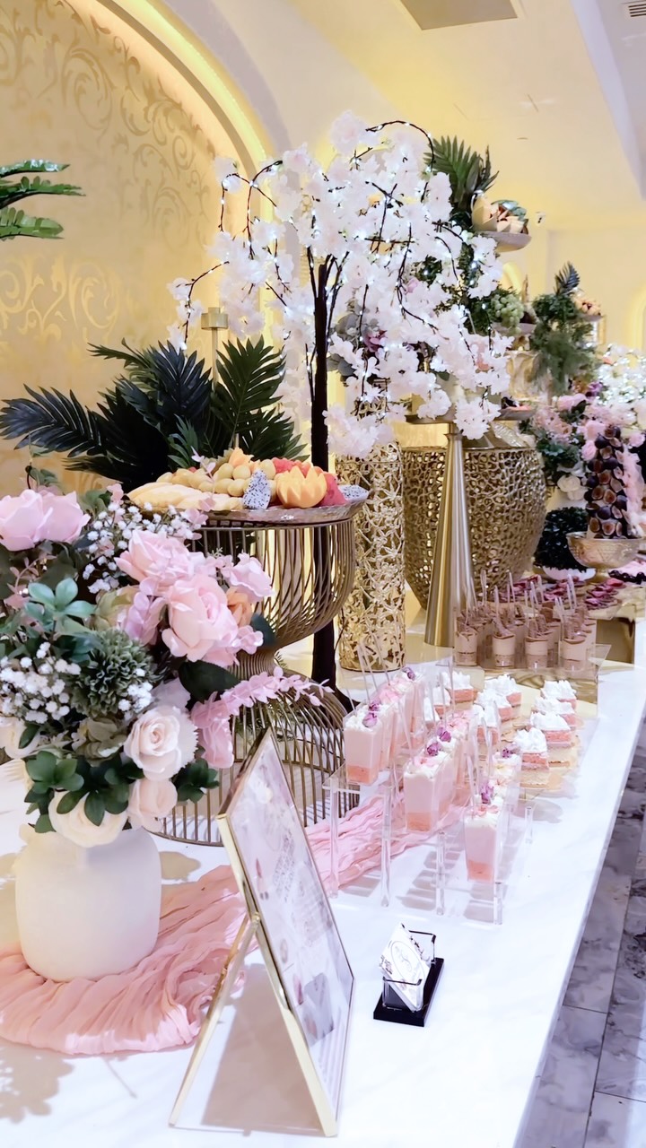 Cakes & Treats By Sarah Facebook ad: Luxury wedding dessert table featuring mini cake slices…