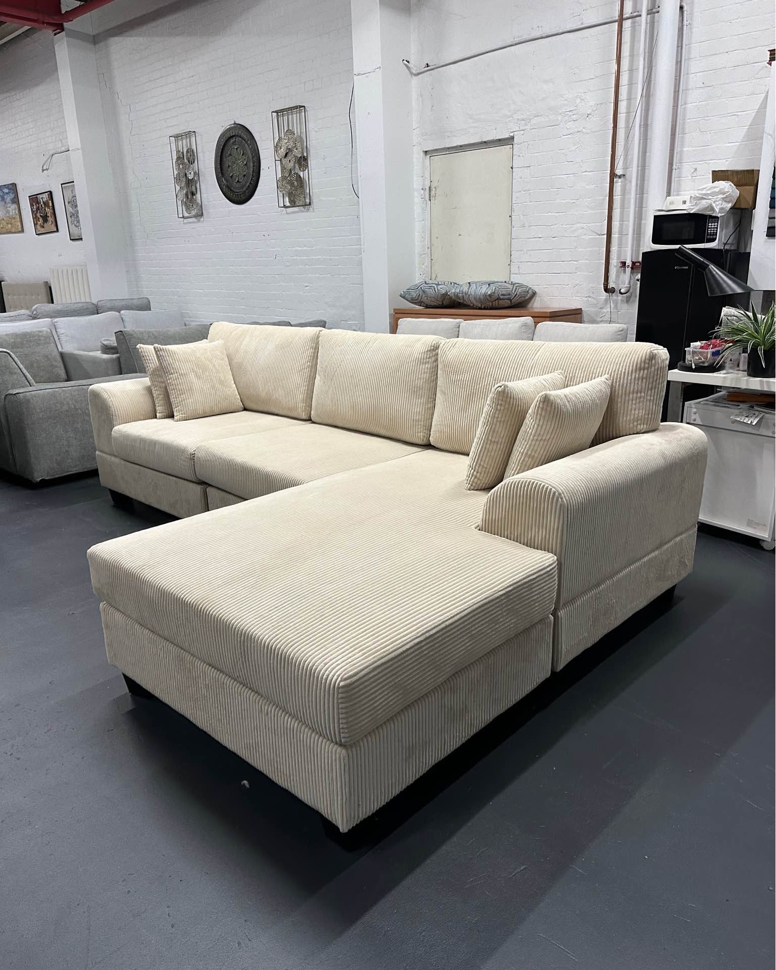 Khurshed Mustafoyev Facebook ad: BRAND NEW CORDUROY L-SHAPE SOFA, FREE DELIVERY SYDNEY ONLY…