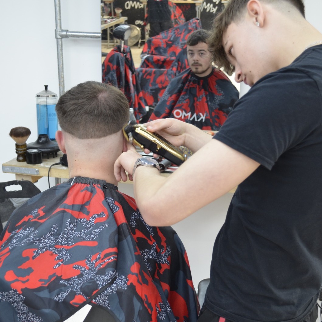 Kamo Barbering Academy Facebook ad: Book Your £1 Haircut Today!