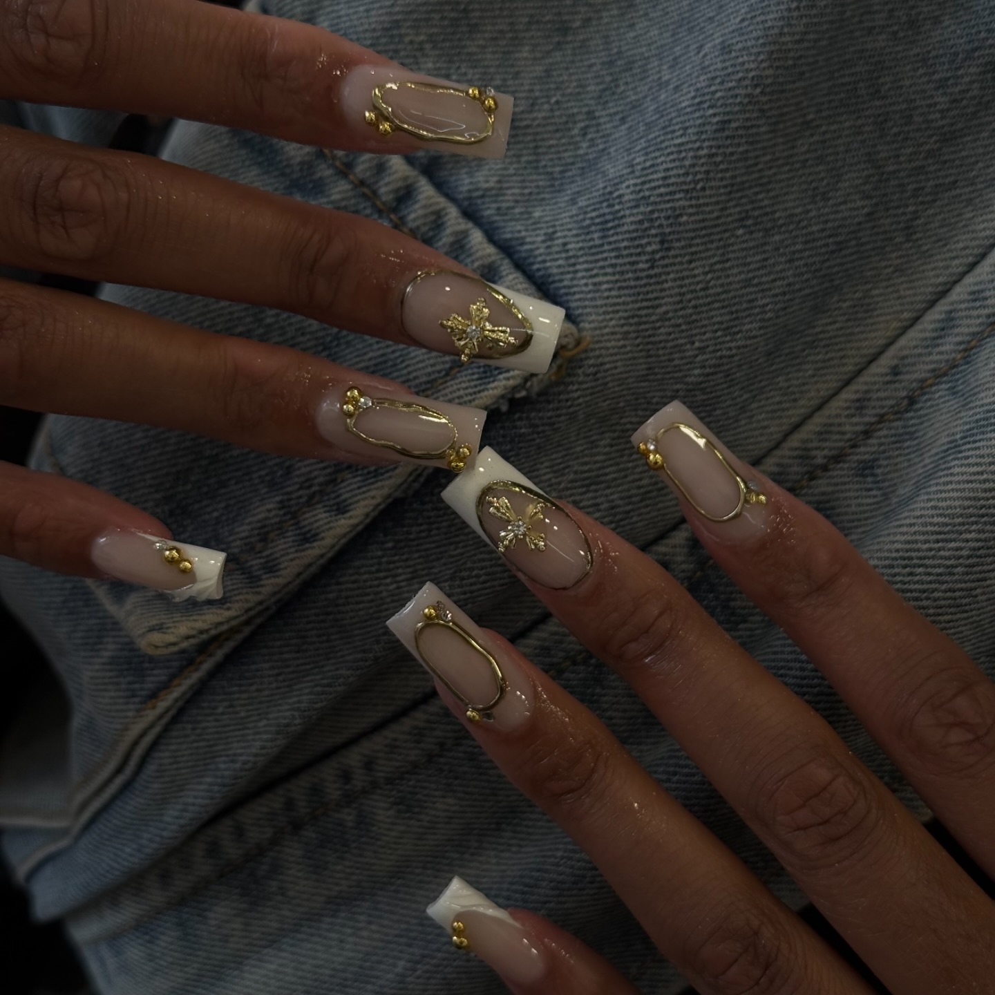 Felicia Nail Salon Facebook ad: Golden glam with a touch of elegance, detailed…
