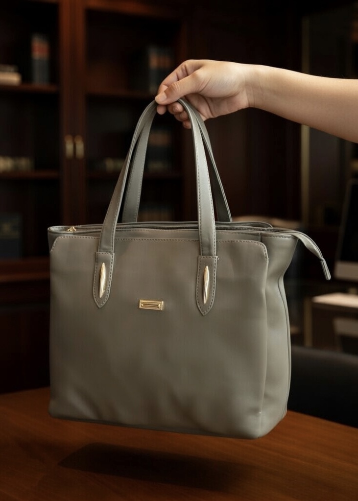 Nook Fashions Facebook ad: Upgrade your work style with premium office handbags