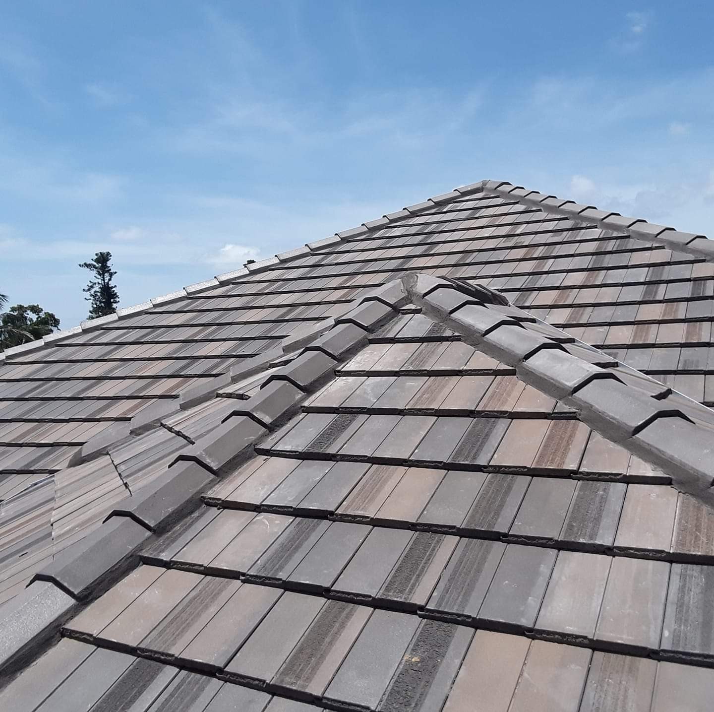 Dean Wilson Roofing Inc. Facebook ad: Re-Roofing & Repair of Tile, Shingle & Low…