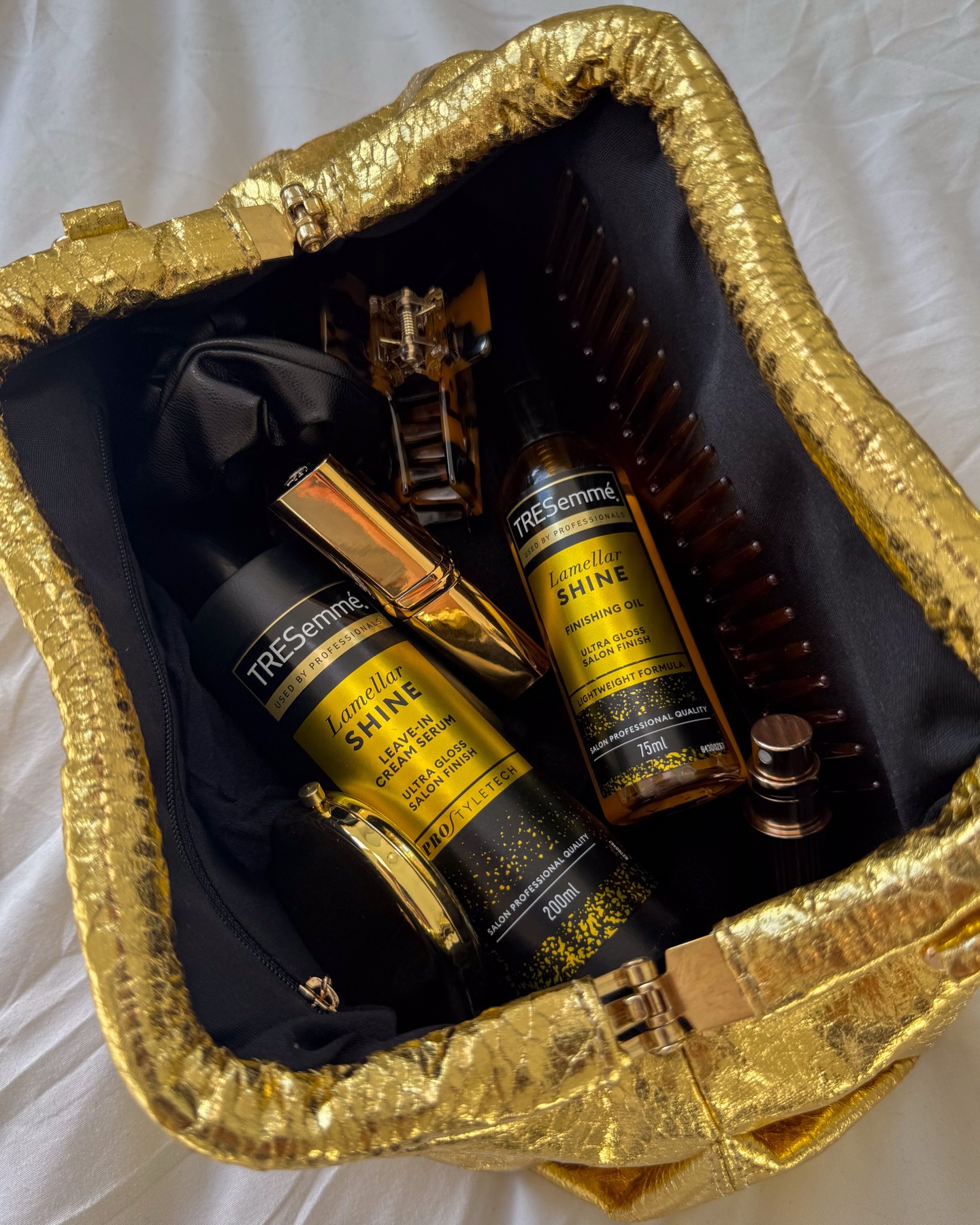 TRESemmé Facebook ad: TRESemmé Lamellar Shine Finishing Hair Oil with patented…