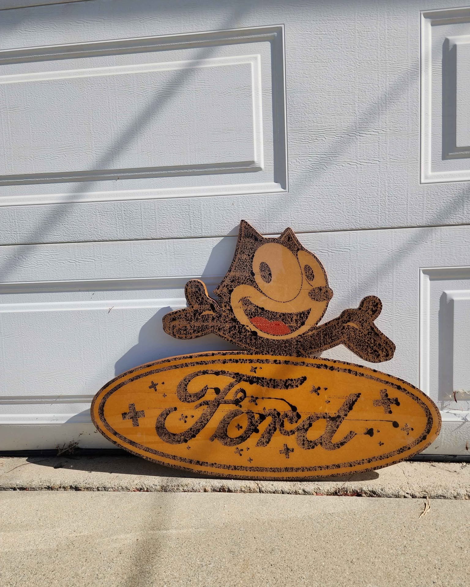 Samantha Aguilar Facebook ad: Aged Ford Felix the Cat Wooden Garage Sign, 2ft