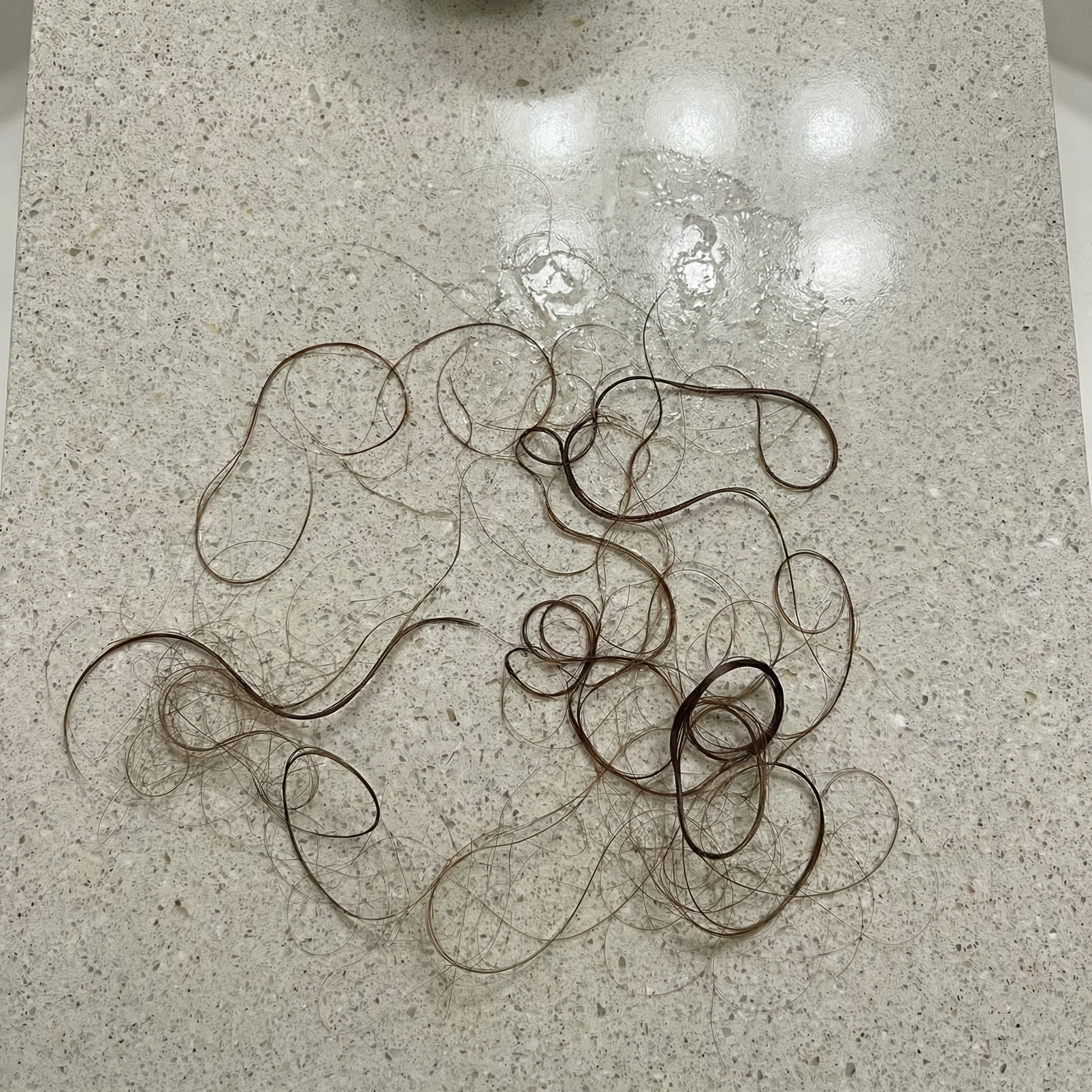 Slimova Facebook ad: Have you noticed more hair on your brush or in the drain…