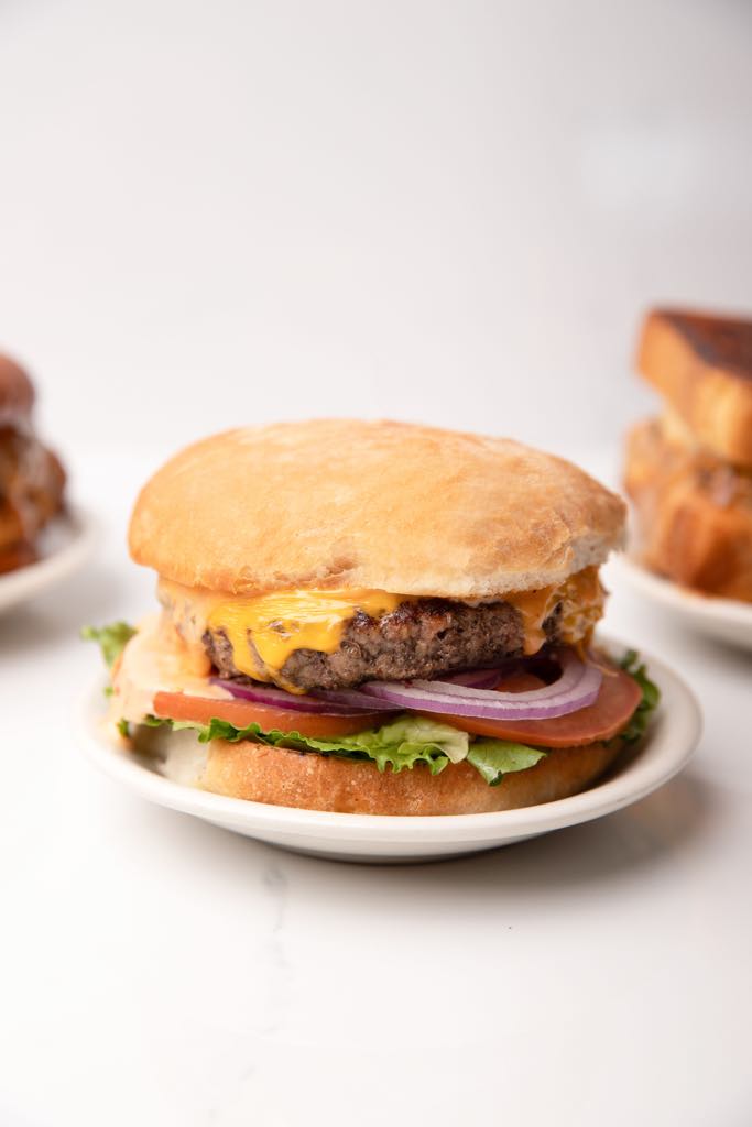 Rookies Craft Burger Bar Facebook ad: Wednesday in house food specials: Burgers & Mussels