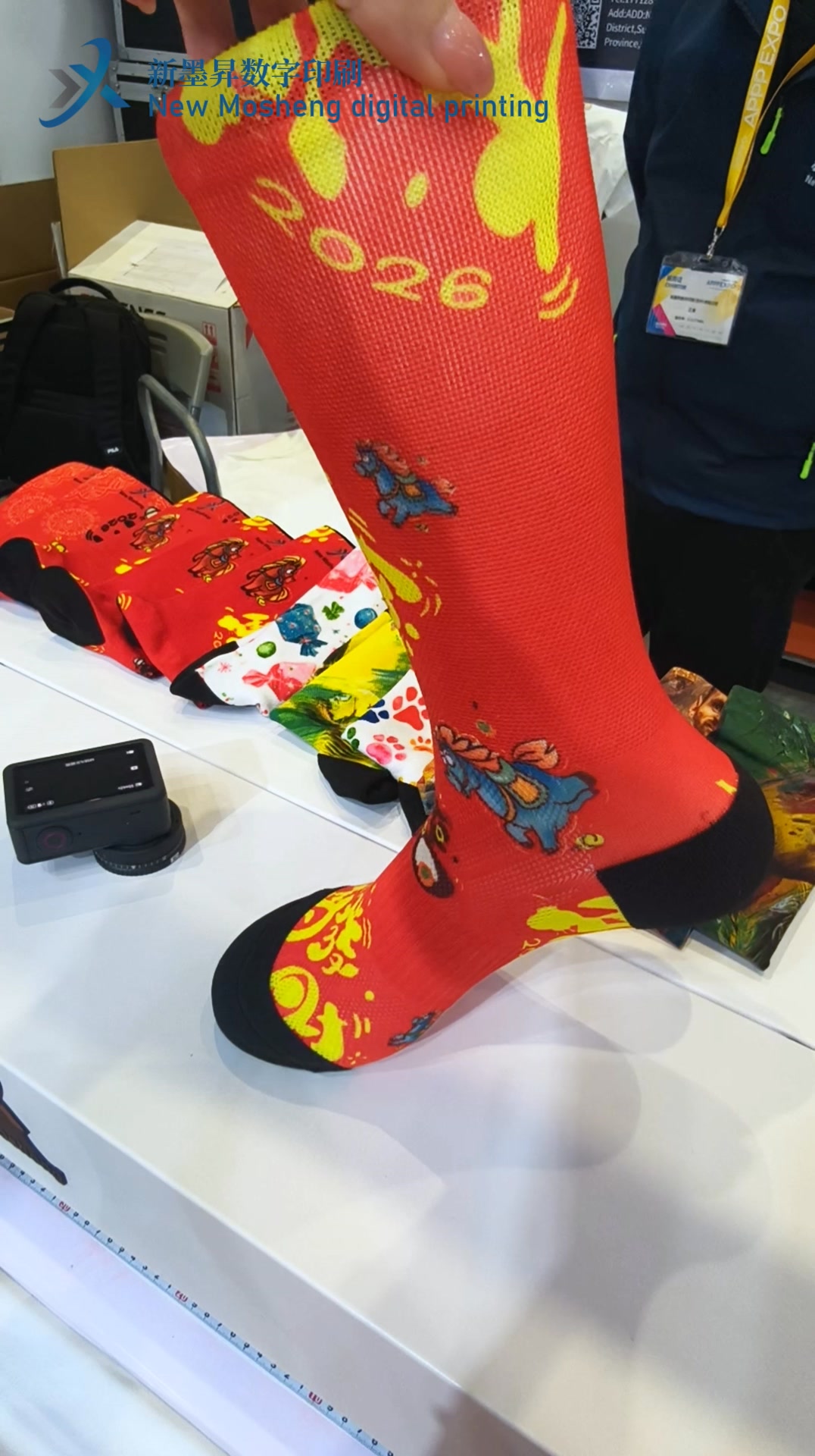 New Mosheng Inkjet Printer Facebook ad: Create one-of-a-kind custom socks & arm sleeves with…
