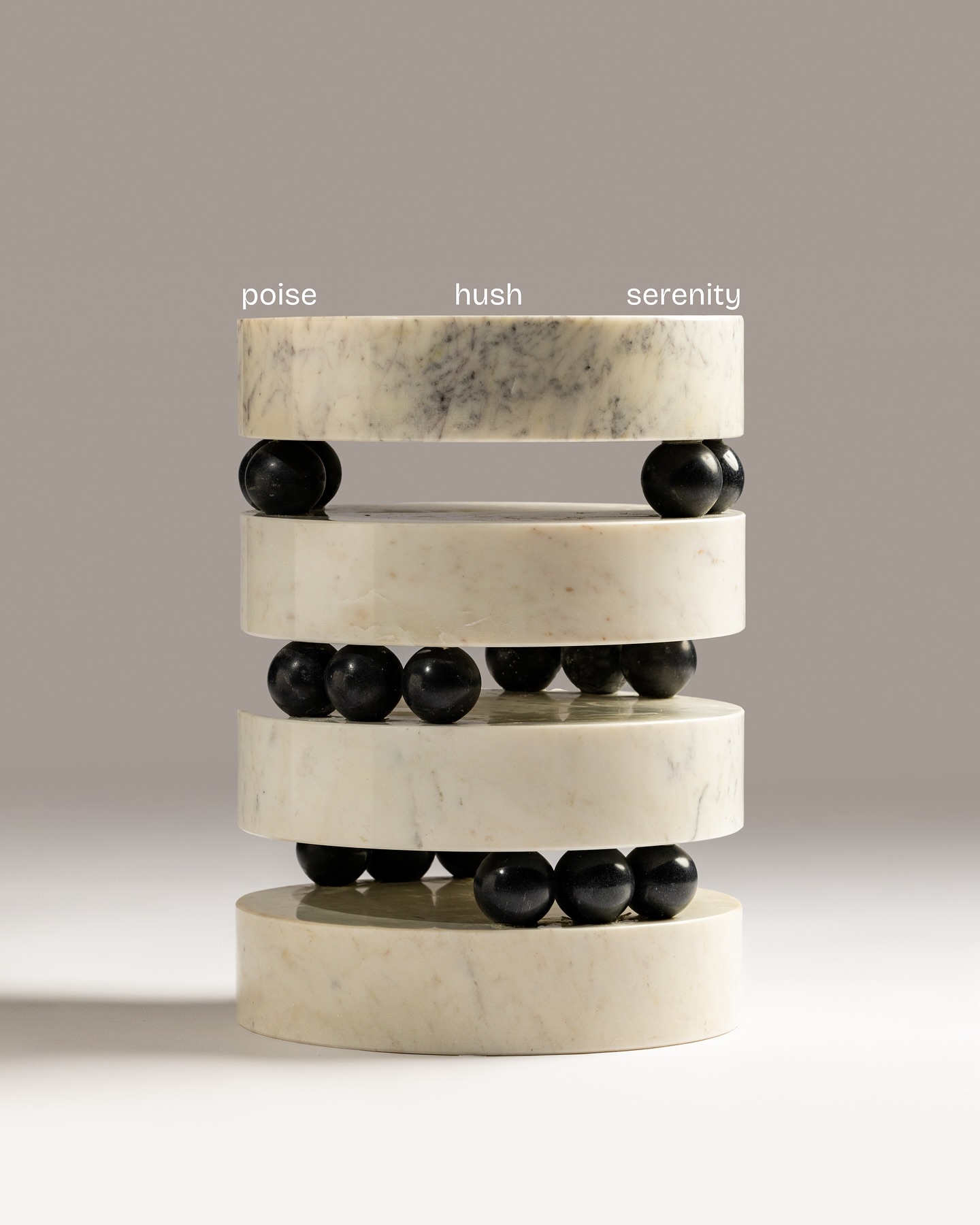 Ziba Homes Facebook ad: Balanced on spheres, suspended in stillness, this table…