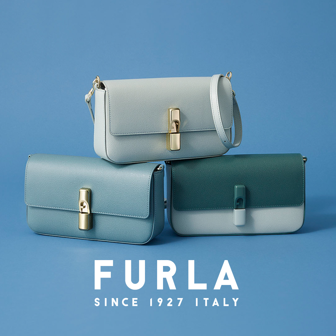 Furla Facebook ad: 朝霧にたなびく雲を思わせる、やわらかなブルー。「フルラ イリデ」に、清らかな印象の新色が登場。