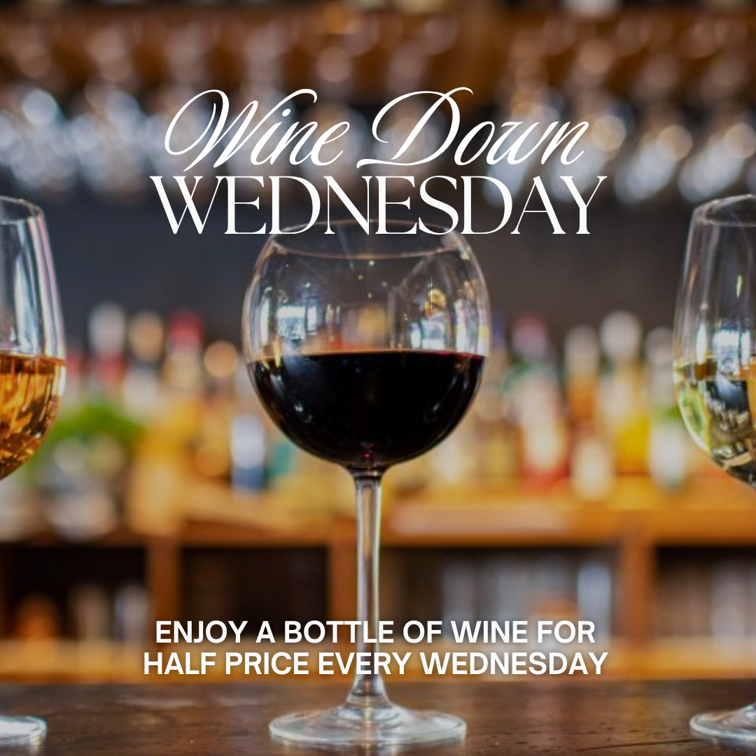 Basil & Grape Facebook ad: Wine Down Wednesday!