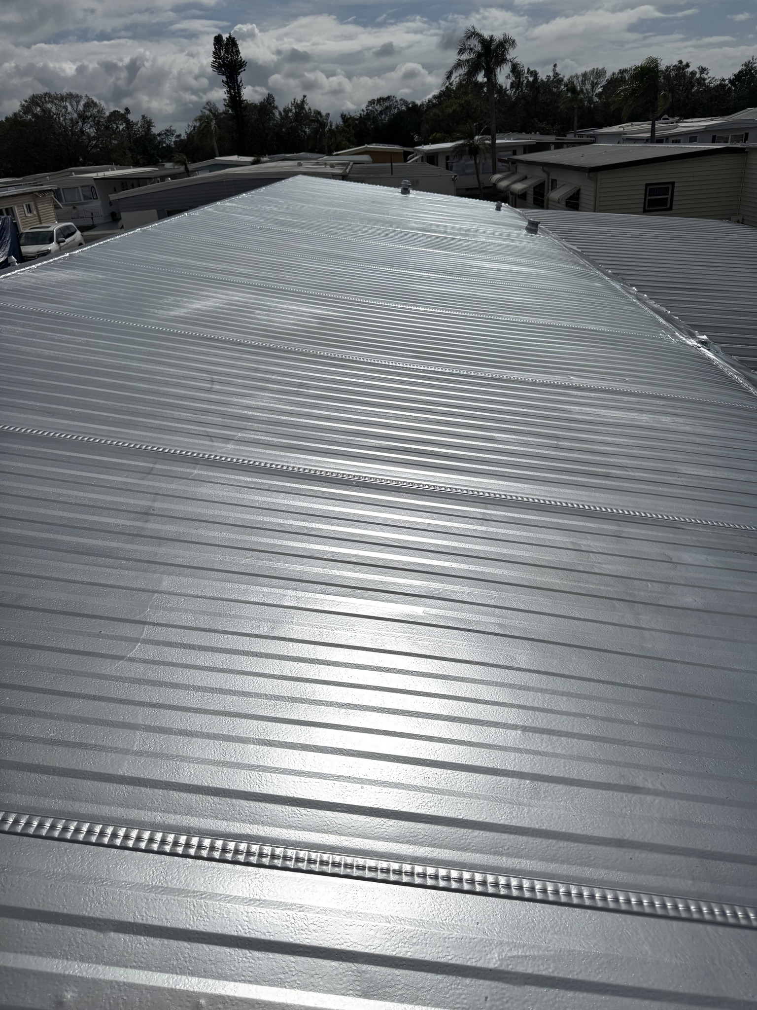 Corrigan Custom Painting LLC Facebook ad: 20% Off Metal Roof Coating