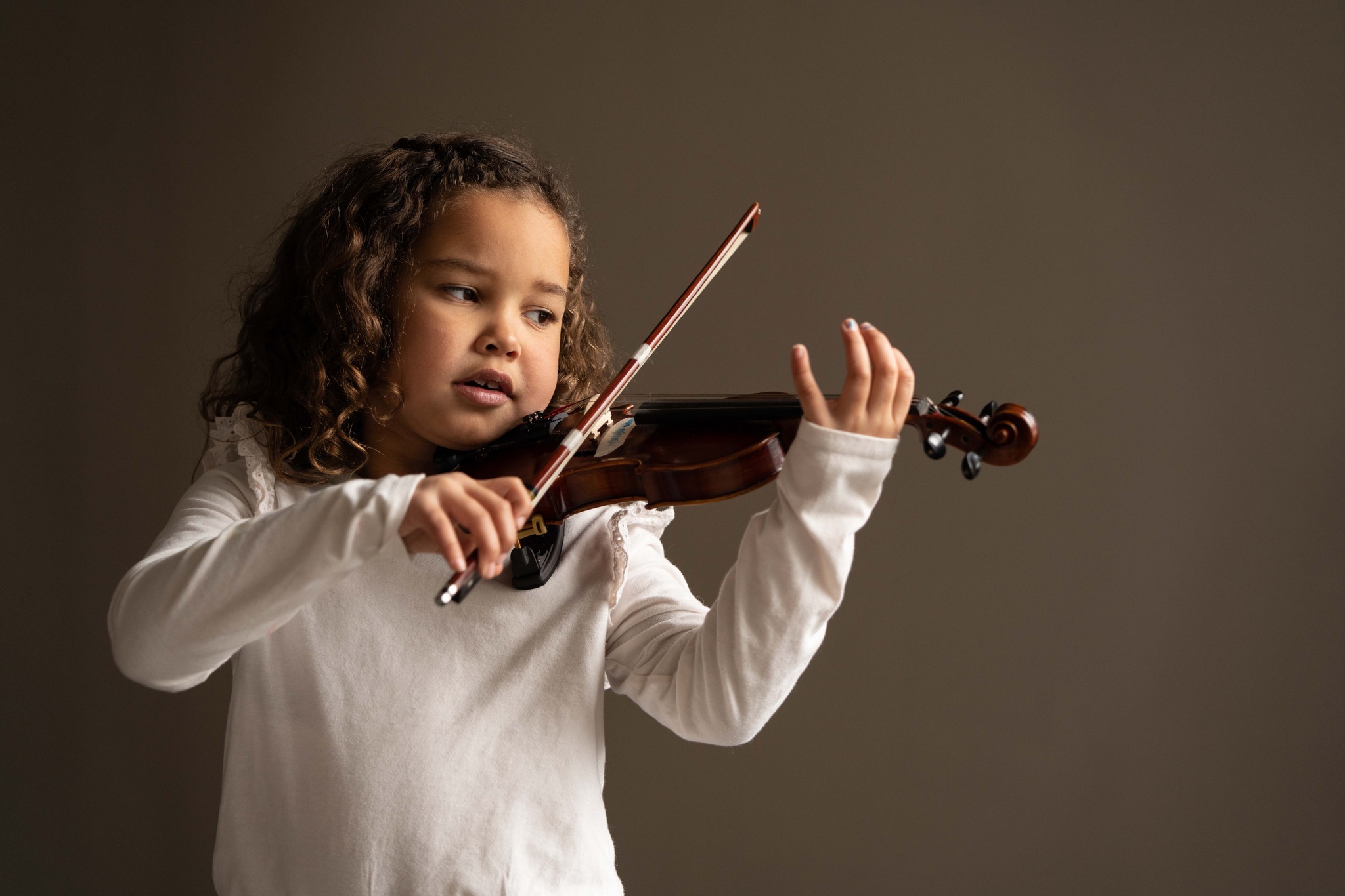 Akron Music Institute Facebook ad: Enroll in private piano, violin, cello, guitar, voice…