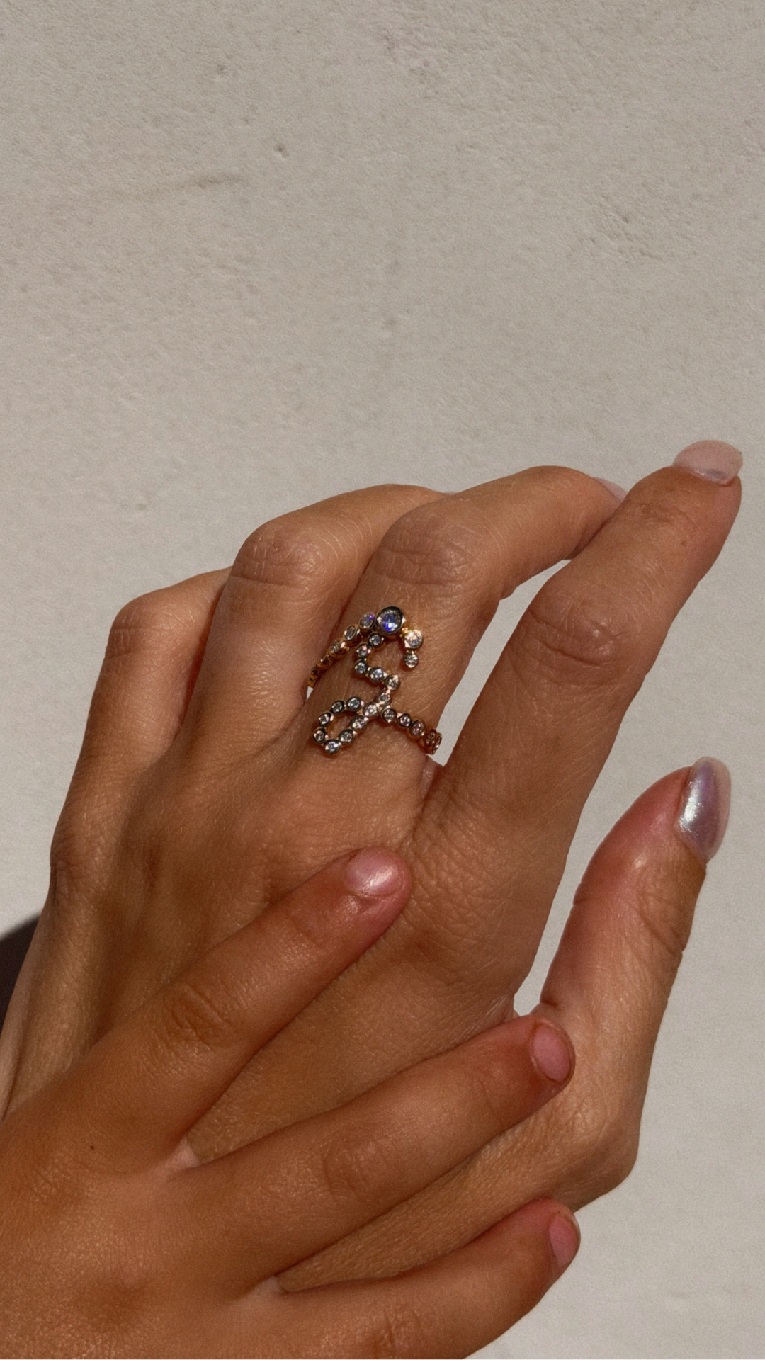 By Lucia Facebook ad: Custom Signature Initial Pavé Ring
