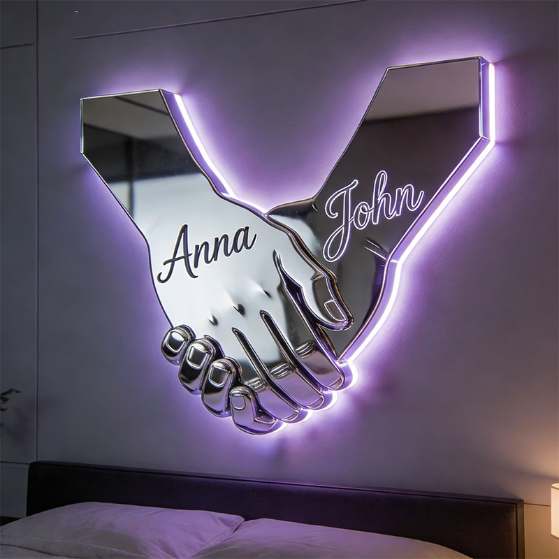brnini.com Facebook ad: Personalized couple holding hands shaped mirror lamp