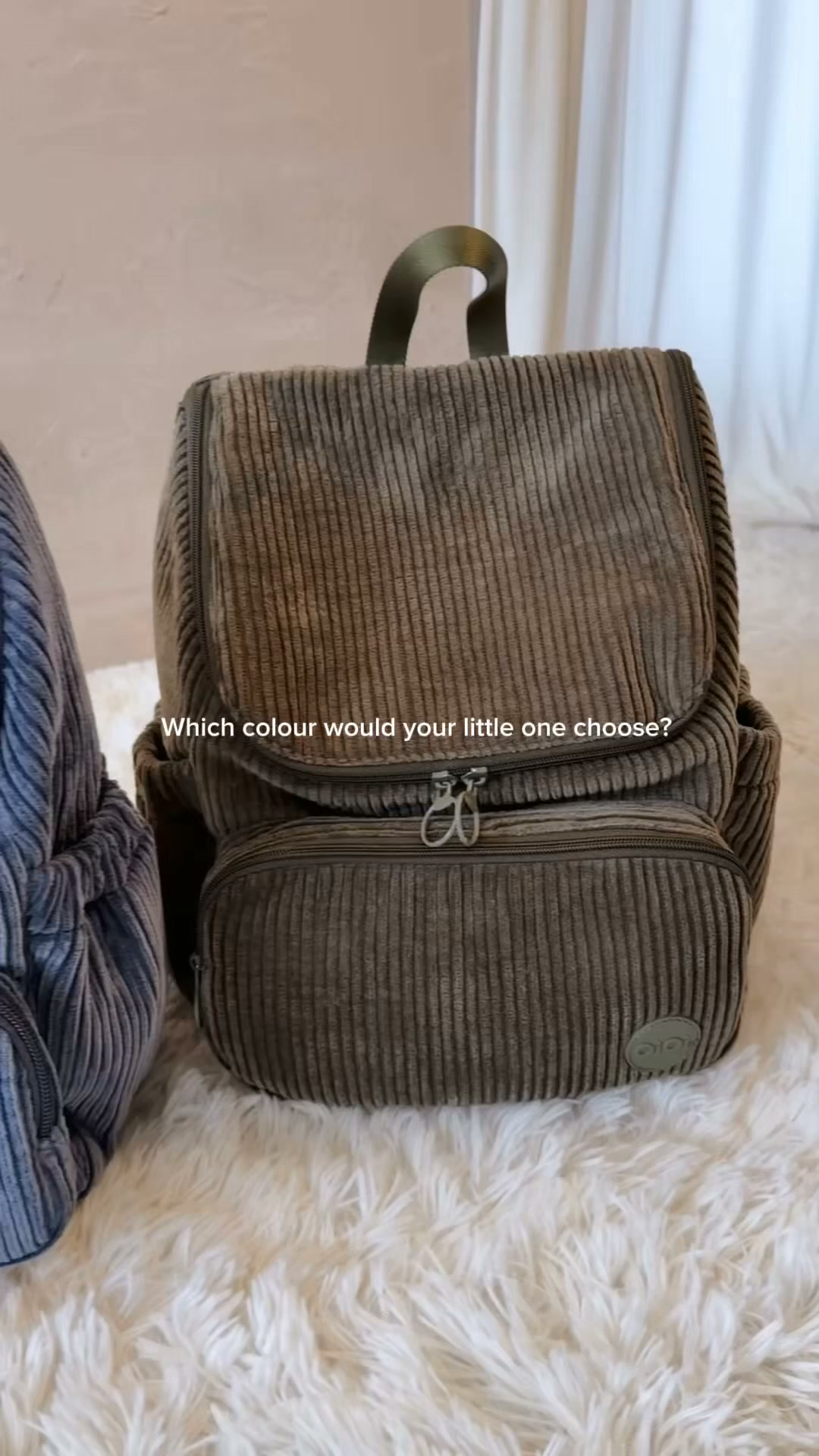 OiOi Facebook ad: Corduroy Kids Backpacks