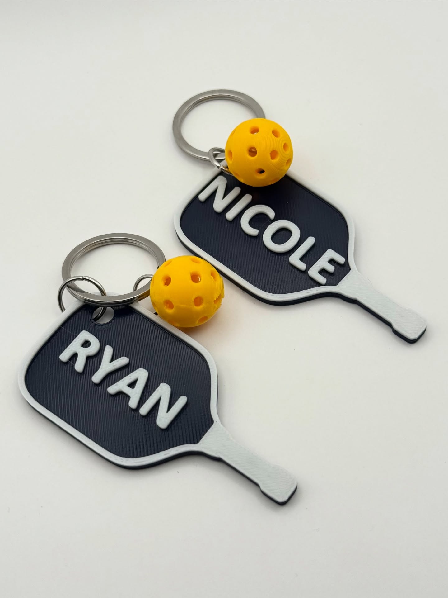 pdstudio.ph Facebook ad: pickleball keychains with an added charm
