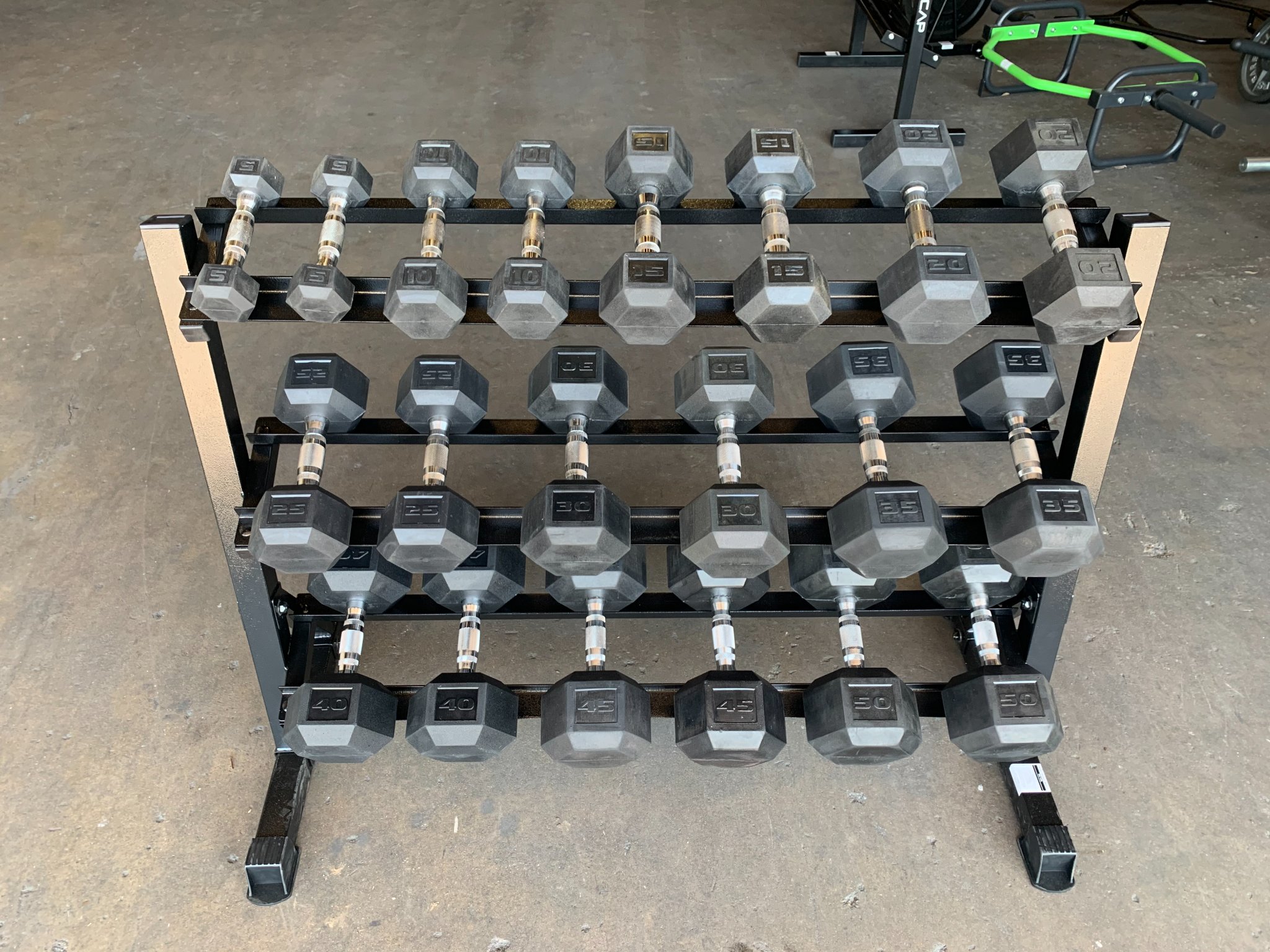 Alan Lee Facebook ad: 5-50 Lb Rubber Coated Hex Dumbbell Set with 3-Tier Heavy…