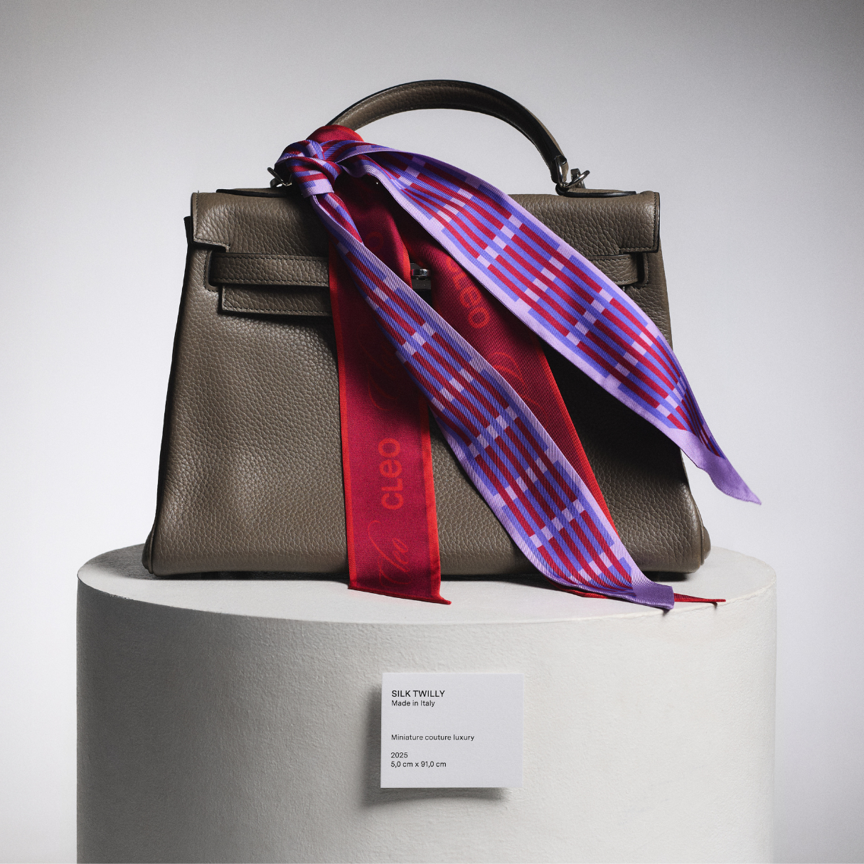 CLEO Pieces Facebook ad: Mulberry silk scarves are Cleo’s signature - light…