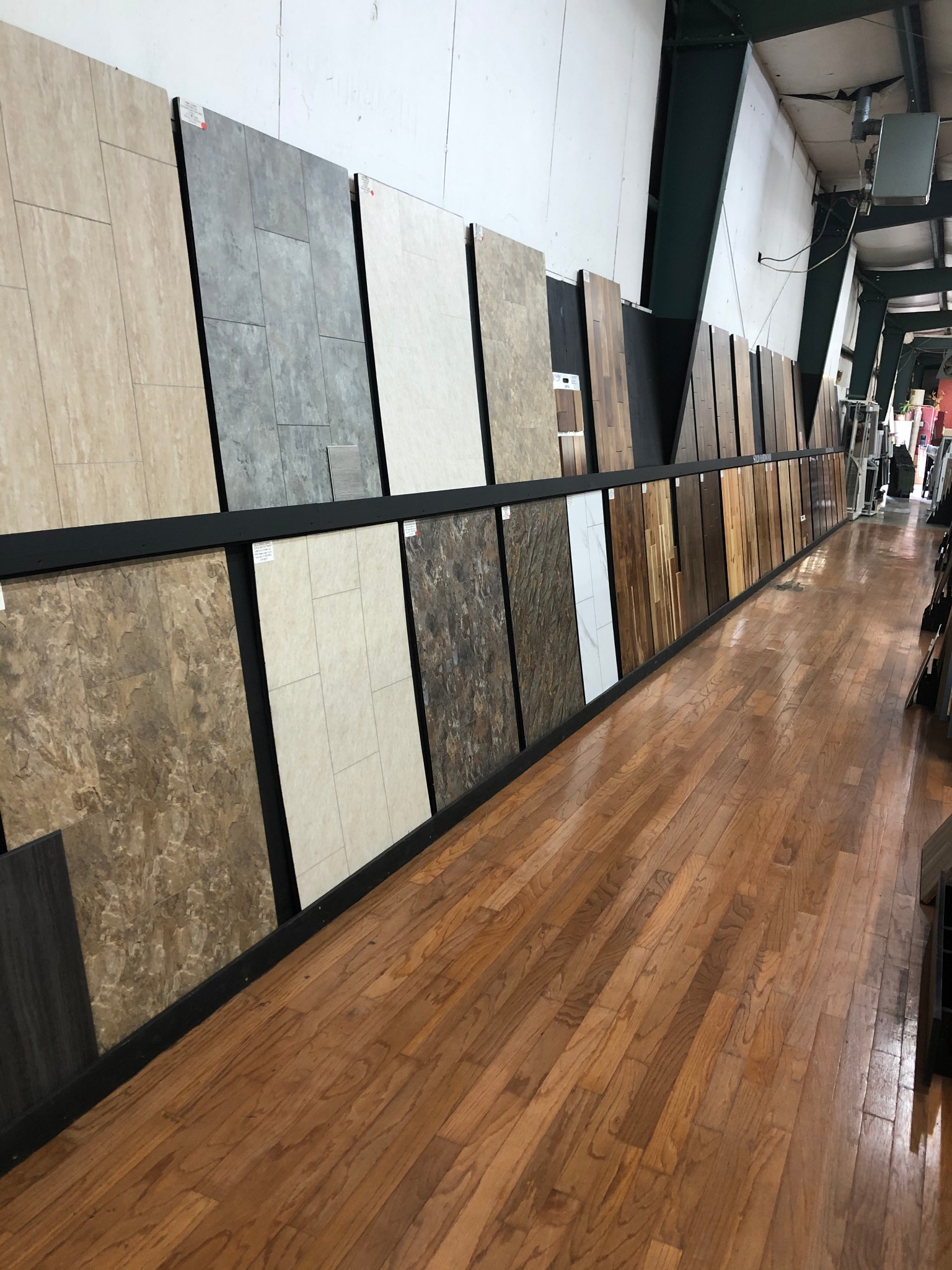 Hank's Carpet & Flooring Facebook ad: Why pay retail for your next flooring project?