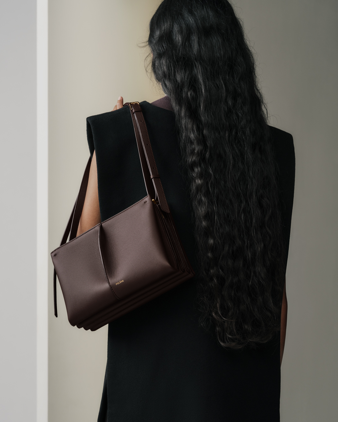 Polène Facebook ad: Its central fold, like a delicately creased page…