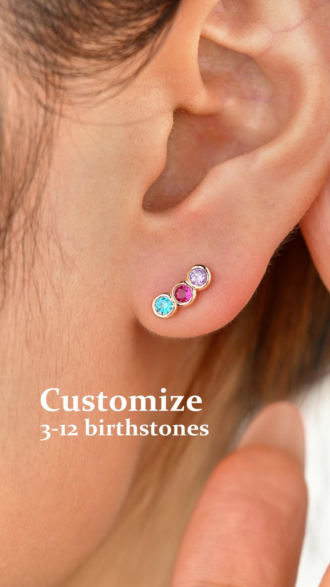 Getnamenecklace Facebook ad: Customizable Multi-Birthstone Stud Earring in 925 Sterling…