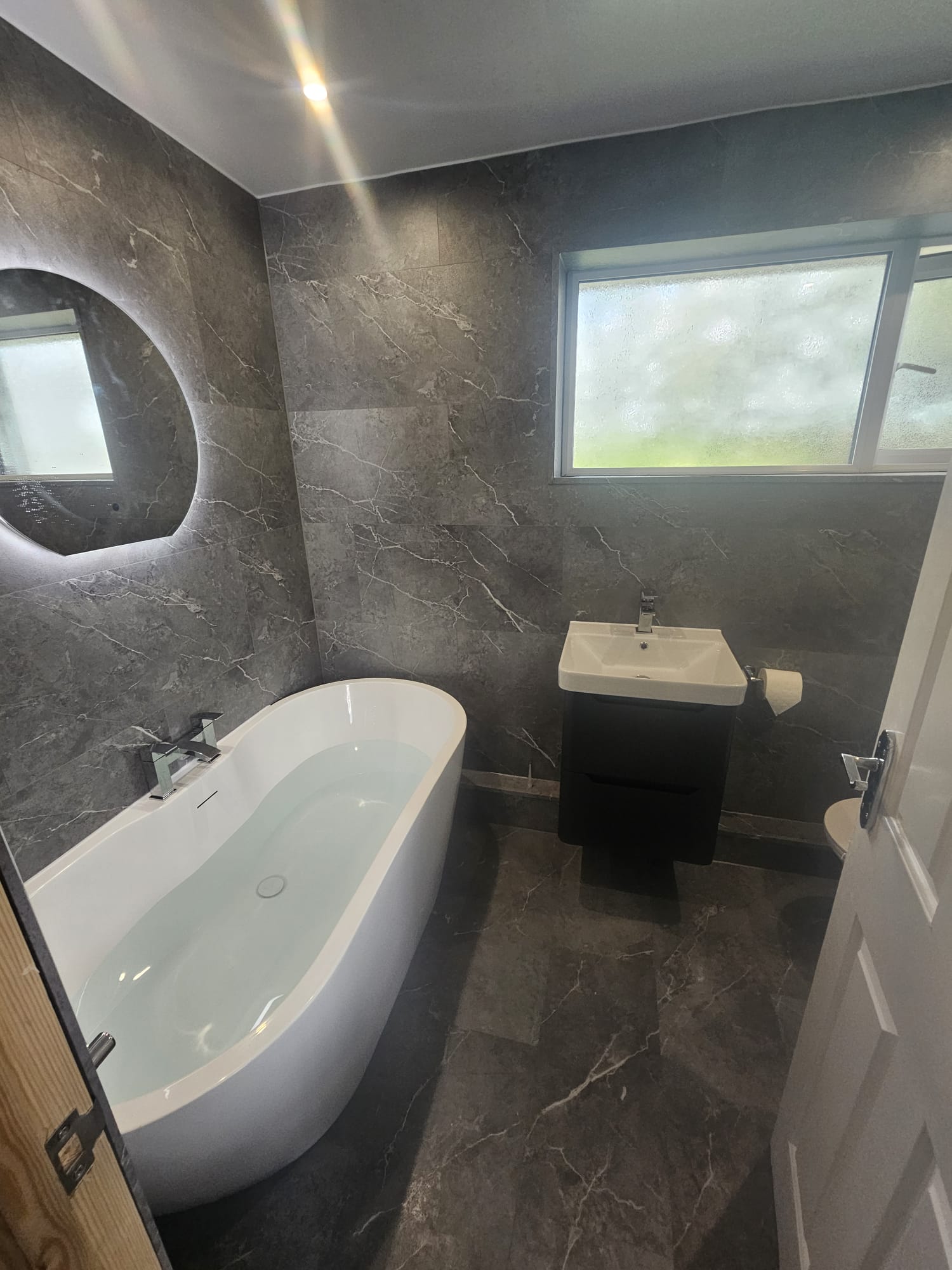 Priory Bathrooms Facebook ad: July & August Bathroom Installation Slots Now Booking