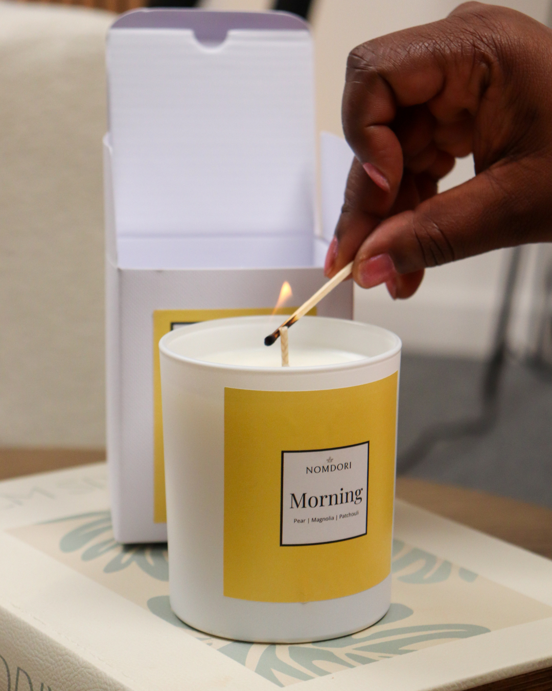 Nomdori Candle Company Facebook ad from Jun 19, 2026