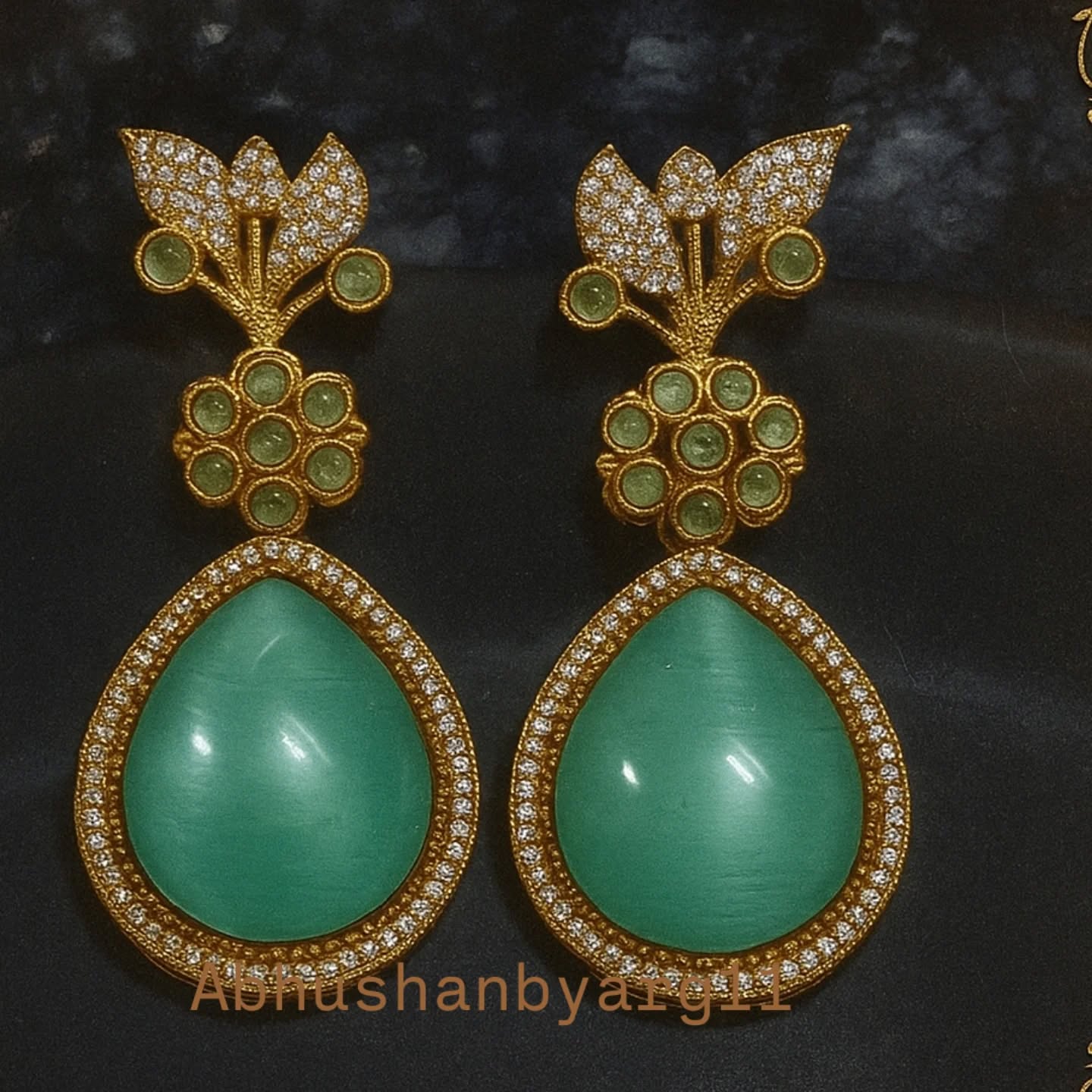 abhushanbyarg11 Facebook ad: Step into elegance with our premium emerald-green teardrop…