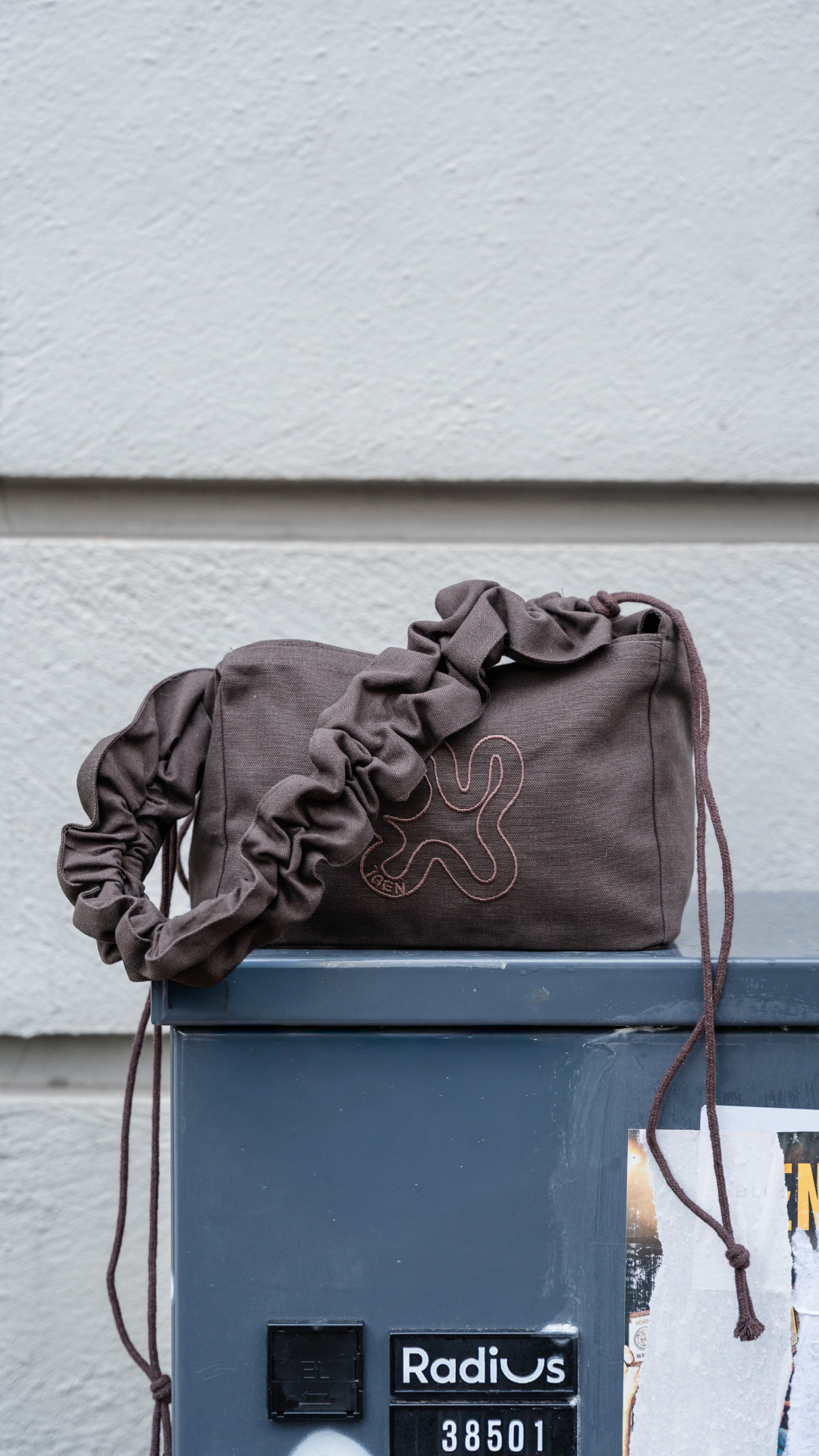 IGEN Facebook ad: Brown Mini Ruffle Shopper →
