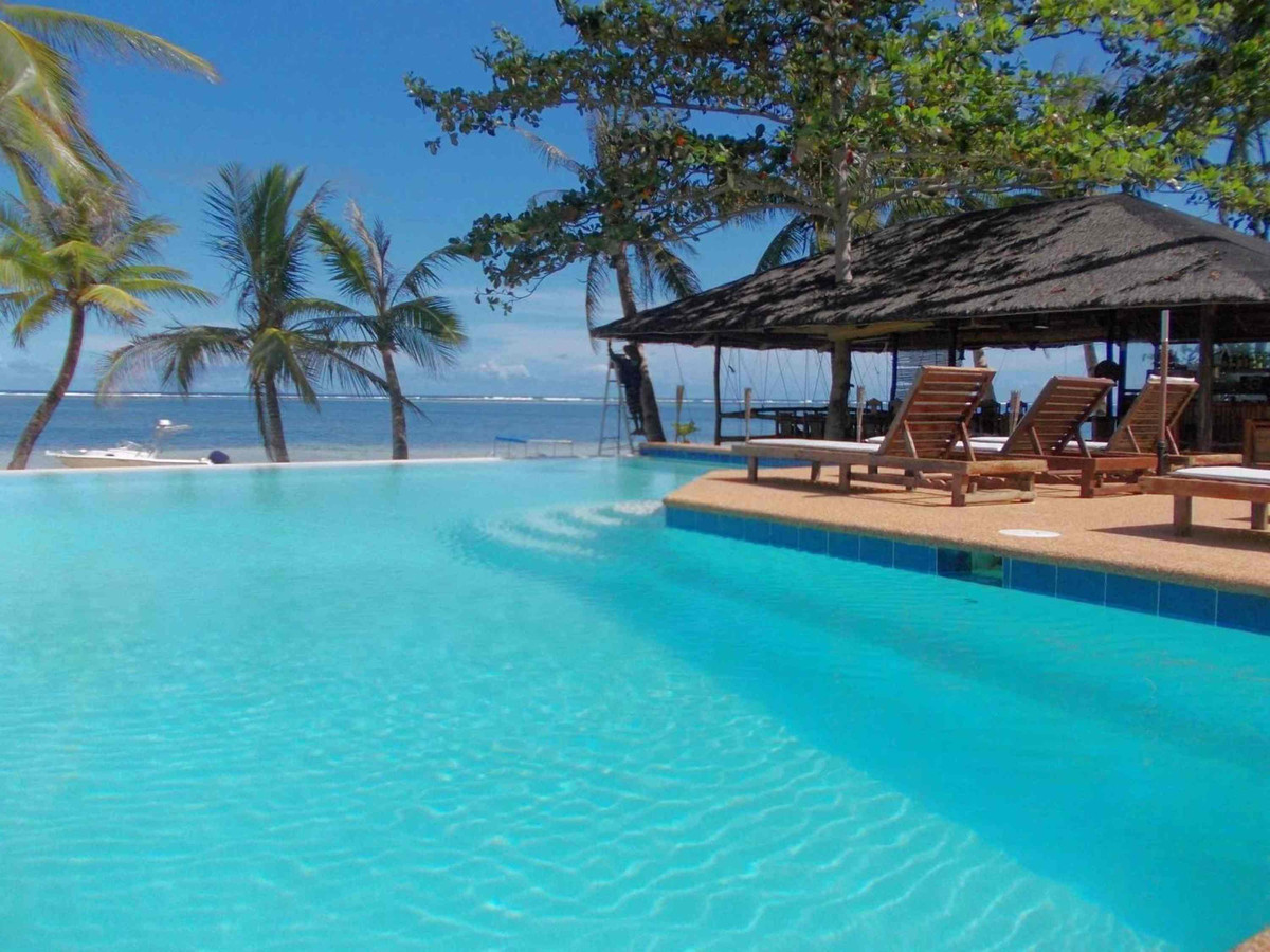 Romantic Beach Villas Siargao Philippines Facebook ad: Enjoy your ROMANCE in summer Siargao!
