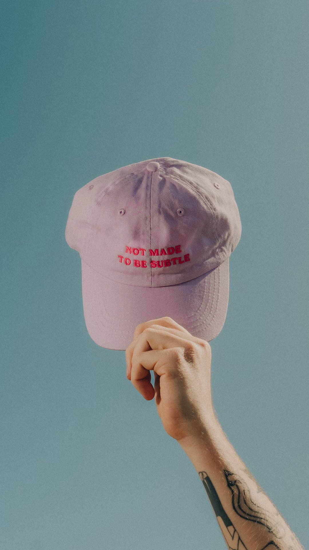 The Spark Company Facebook ad: Every Purchase Helps A Woman In Need