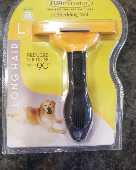 Jacqueline Mills Facebook ad: Furminator deShedding Comb