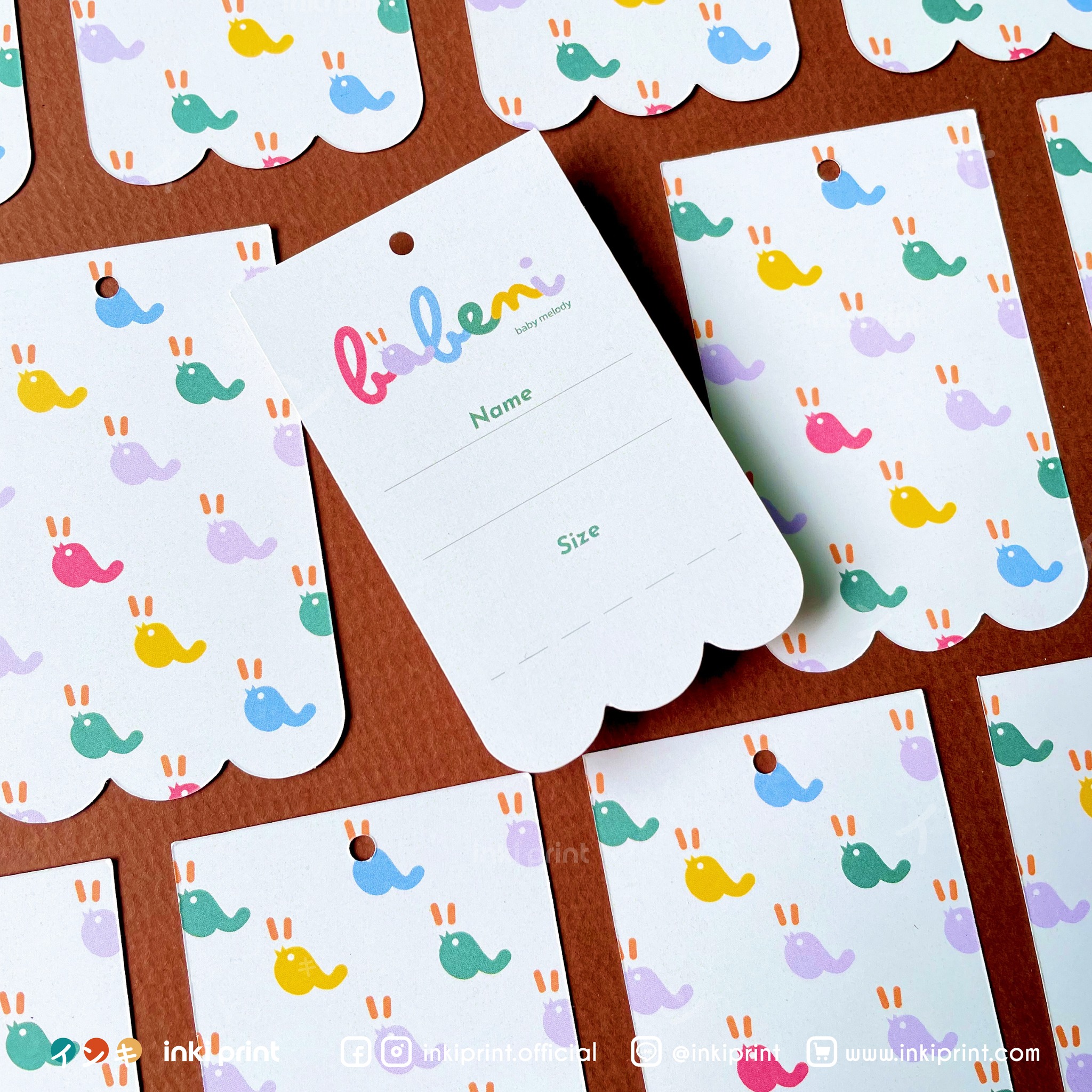 ฉลากสินค้า By Inkiprint Facebook ad: รับผลิตป้ายแท็กสินค้า Tag Label ห้อยสินค้าได้หลากหลาย…