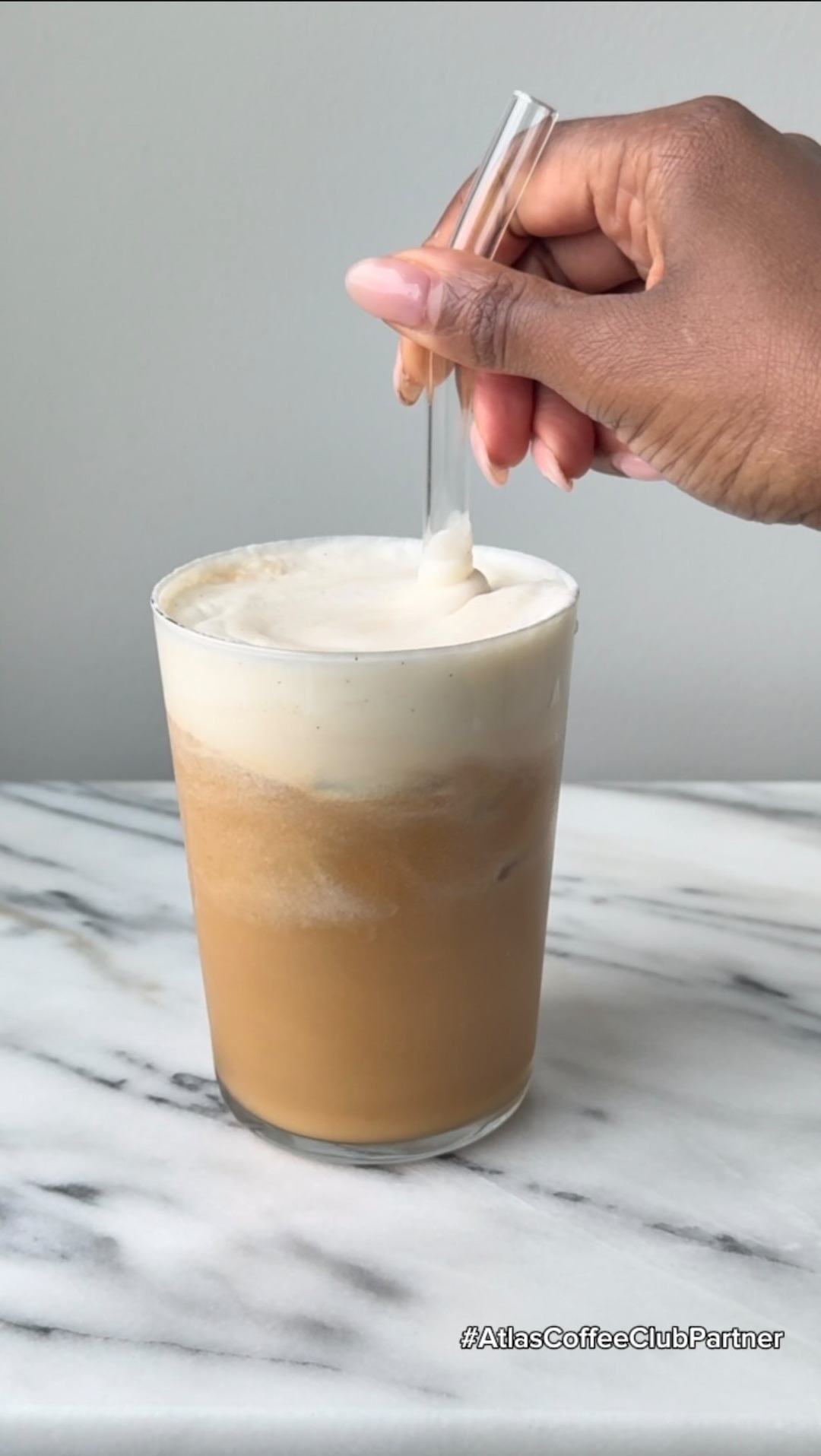 Atlas Coffee Club Facebook ad: Making an iced coffee topped with vanilla-bourbon cold…