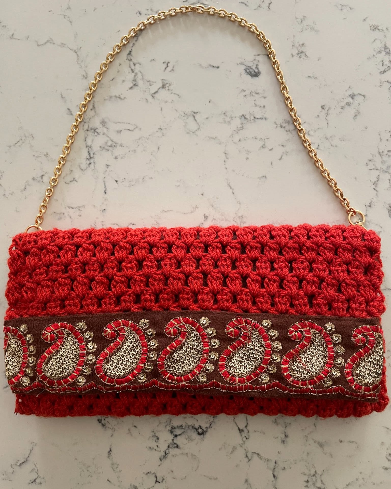 Sarah Vernuccio Facebook ad: Ruby Red Crochet Clutch Bag | Paisley Embroidered Wool…
