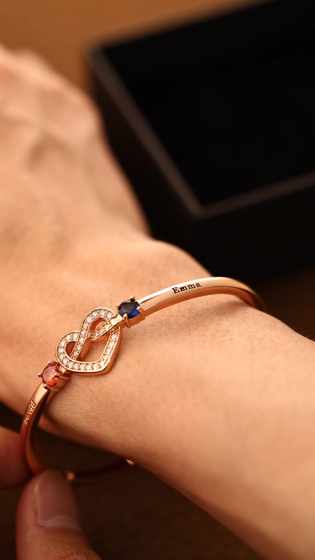Woohops Facebook ad: Personalized Couple Birthstone Bracelet