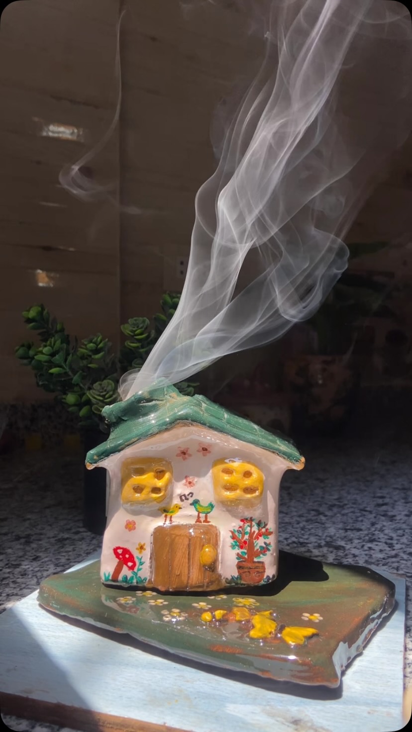 Made By Youssra Facebook ad: Handmade ceramic house incense burner.