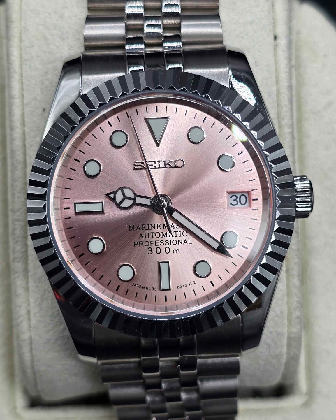 Erik Zwillinger Facebook ad: Silver Just the Date Custom Built NH35 TMI mens watch…